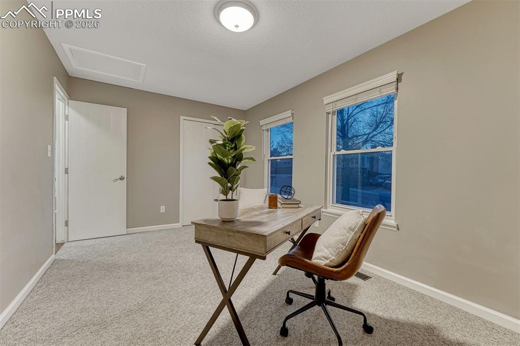 Large main level bedroom 2 has mountain views