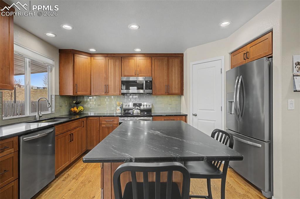 Custom remodeled kitchen featuring a corner pantry and large island!