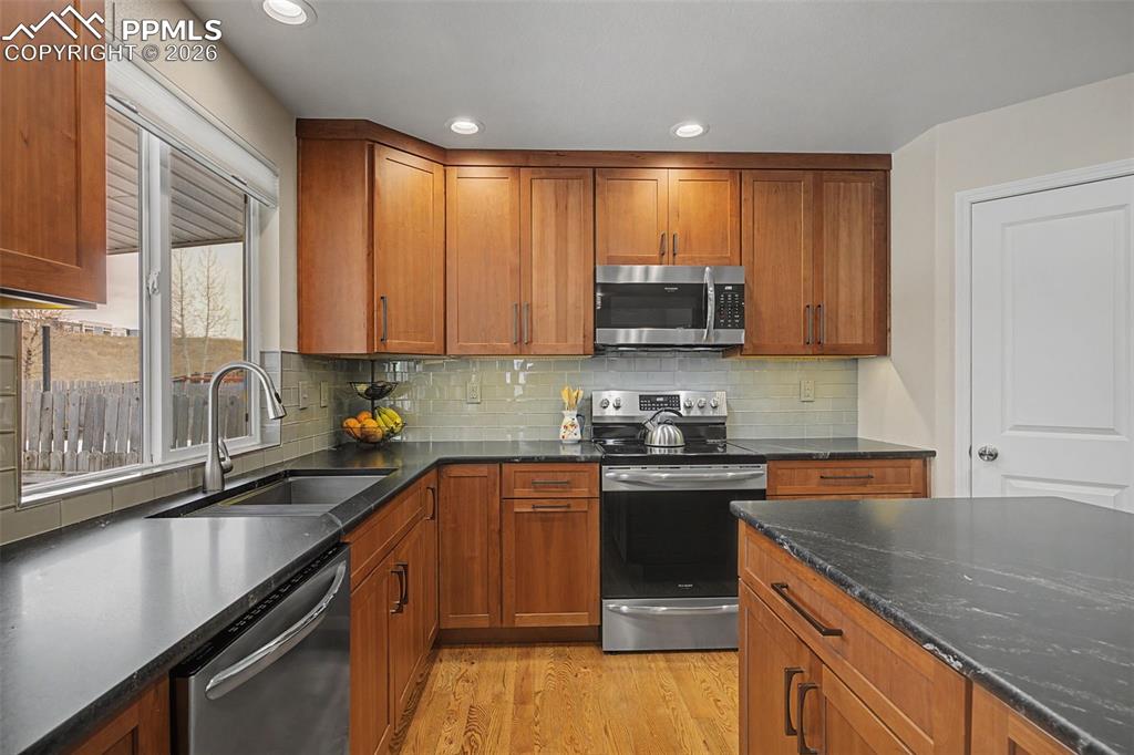 Custom remodeled kitchen featuring a corner pantry and large island!