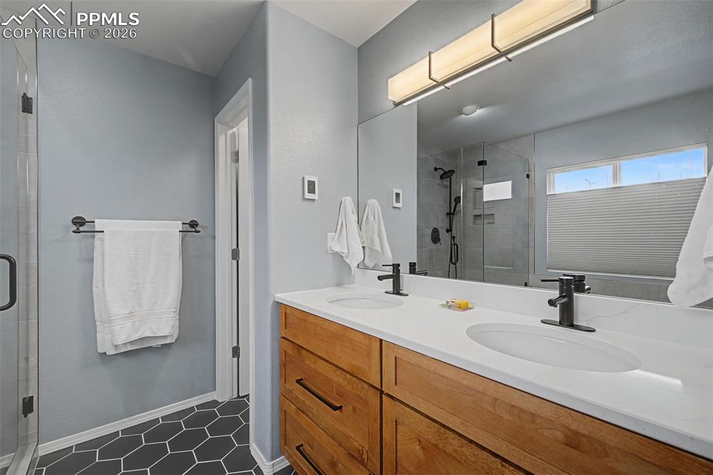 Tastefully remodeled primary bedroom 5 piece bathroom.