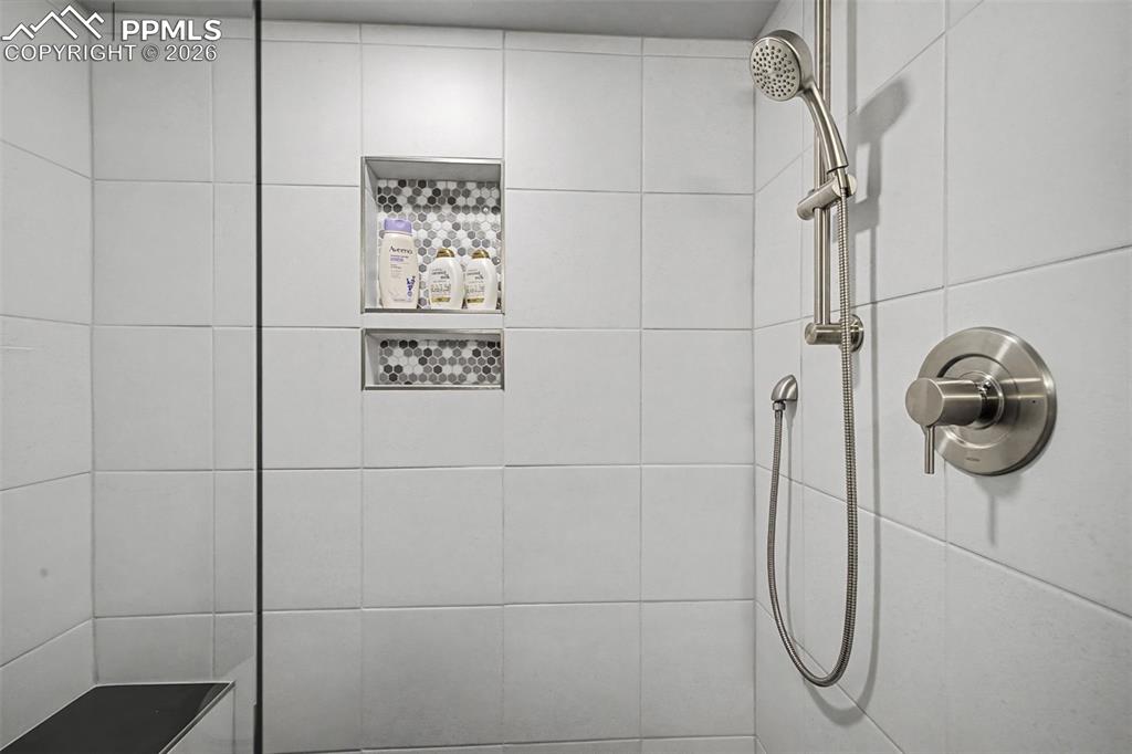 Beautiful tile work in basement bathroom!
