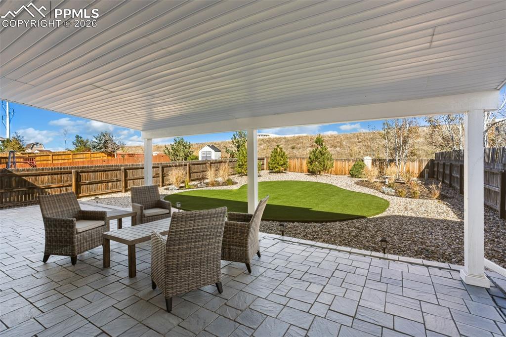 Large stamped covered patio for entertaining!
