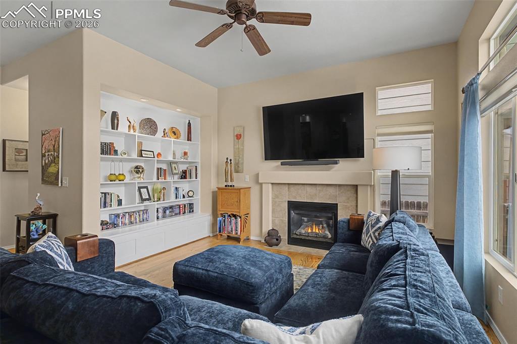 Welcoming main level family room with more built ins and fireplace!