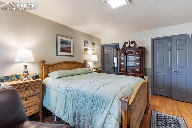 Bedroom featuring wood finished floors