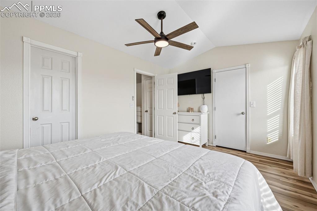 Bedroom featuring a ceiling fan and wood finished floors