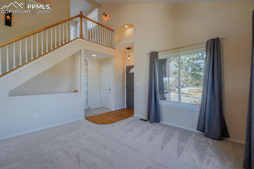 View of staircase to upper level from the living room
