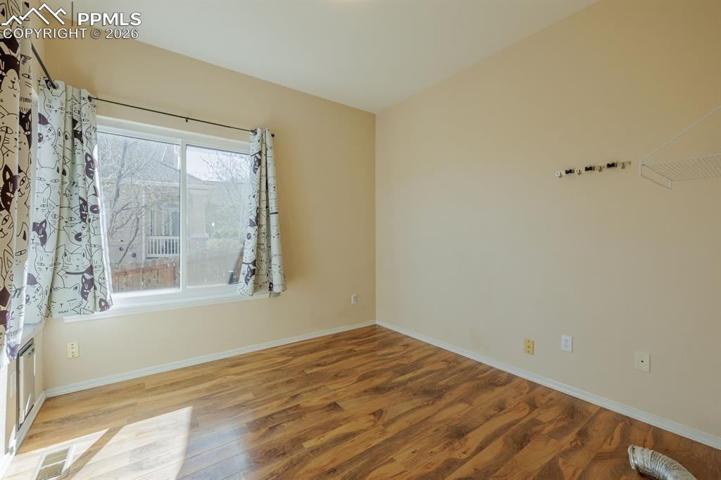 Main Level Bedroom which has been used as a laundry room