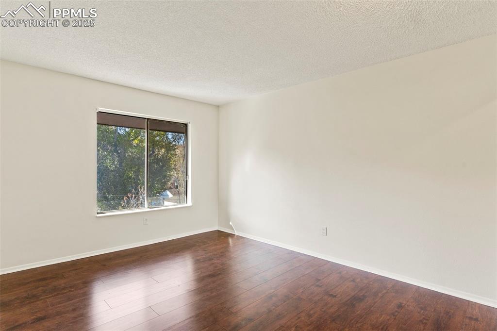 Primary bedroom on upper level with mountain views