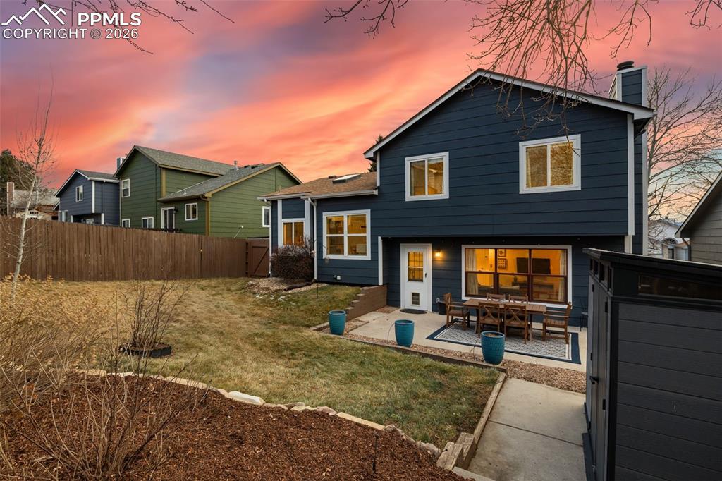 Fully landscaped with wonderful patio and large and modern shed.