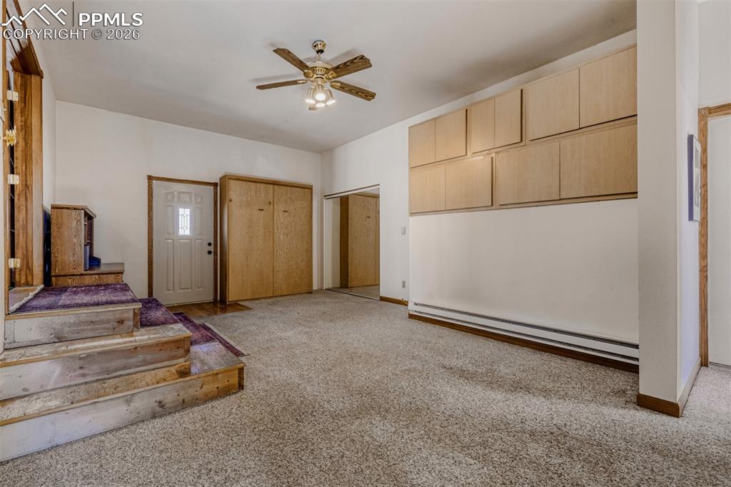 Flex space with Murphy bed, cabinets, closet and separate entrance.