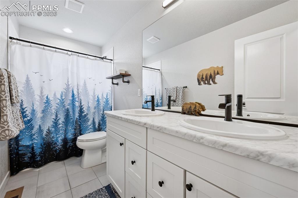 Dual sinks in Hall Bathroom