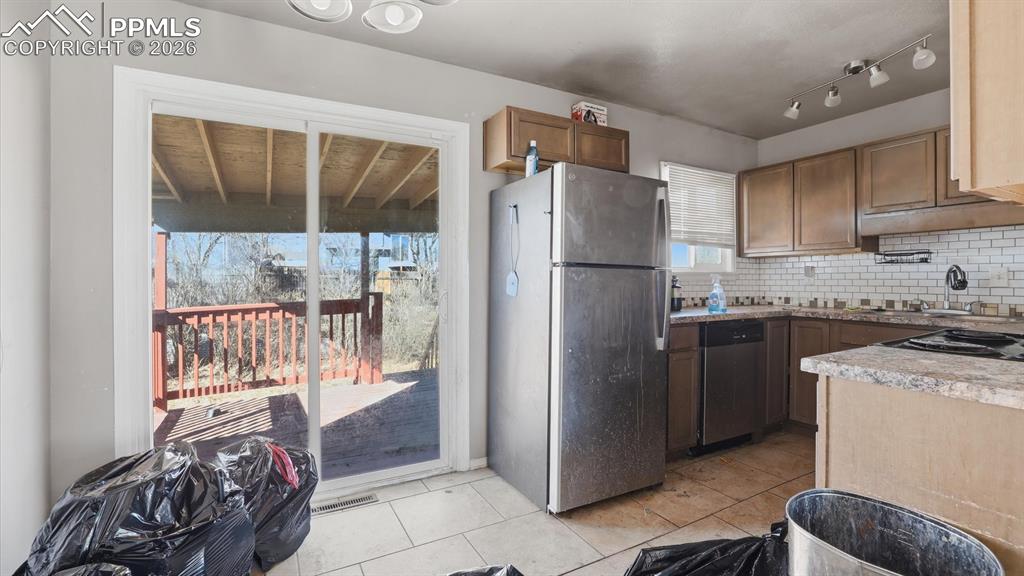 The Dining Area flows into the Kitchen making it easy for food service and clean up.