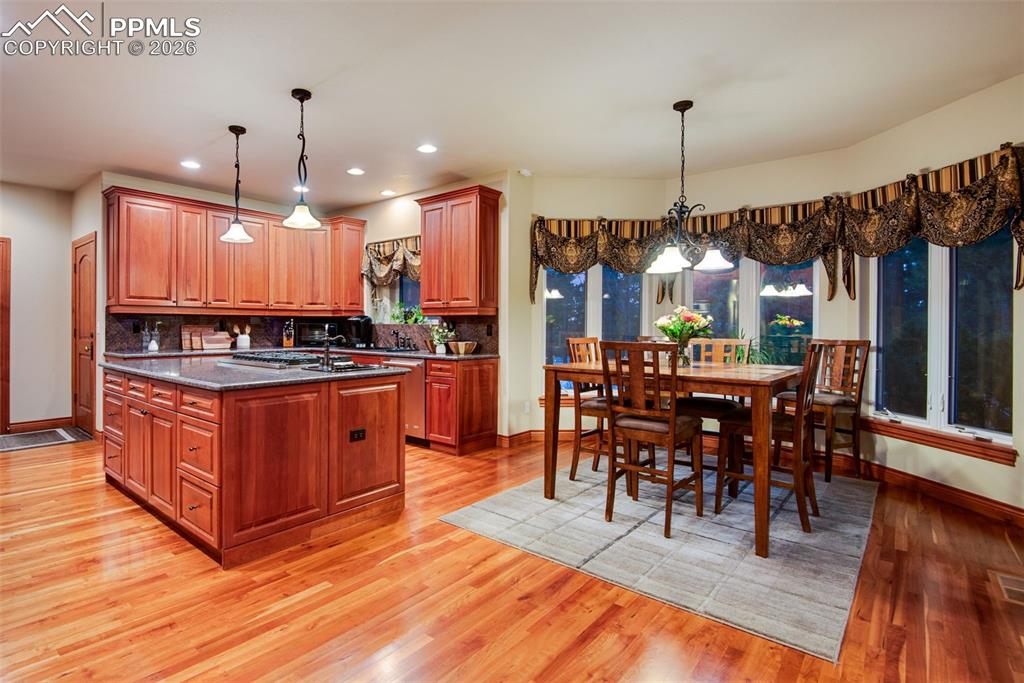 Kitchen view with eat-in dining area
