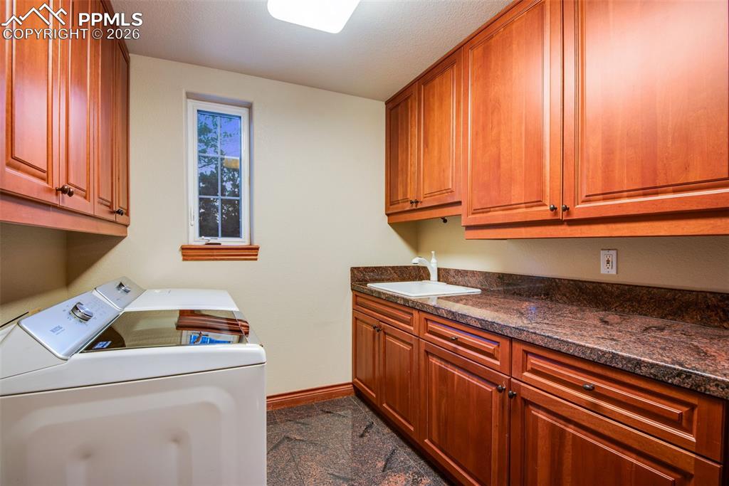 Laundry room located on the main level right off of the garage