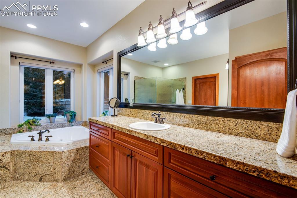 One of two vanity areas in the primary bathroom