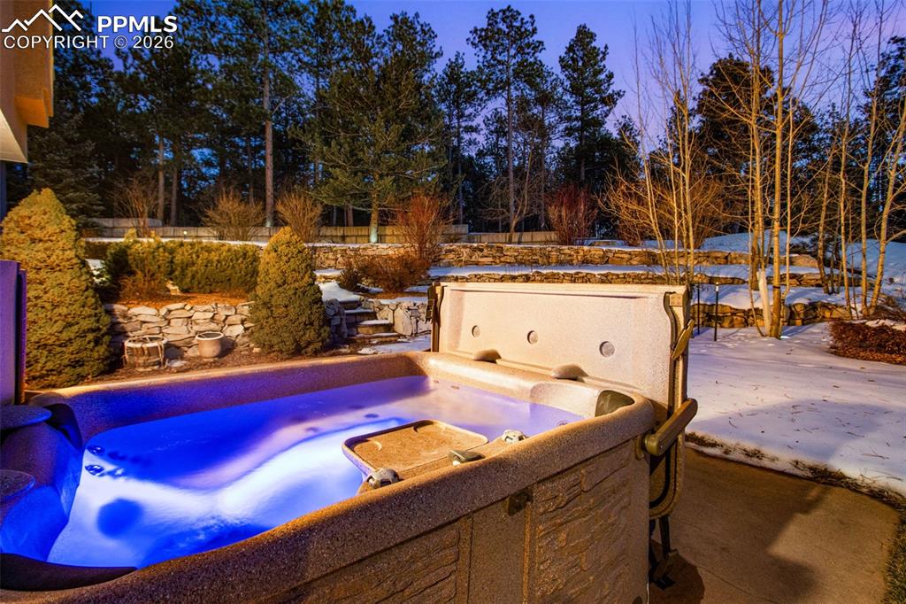 Hot tub located on the patio of the walkout basement