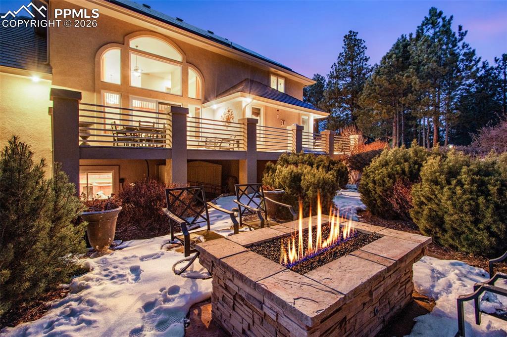 View from the gas fire pit in the back yard looking east towards the house