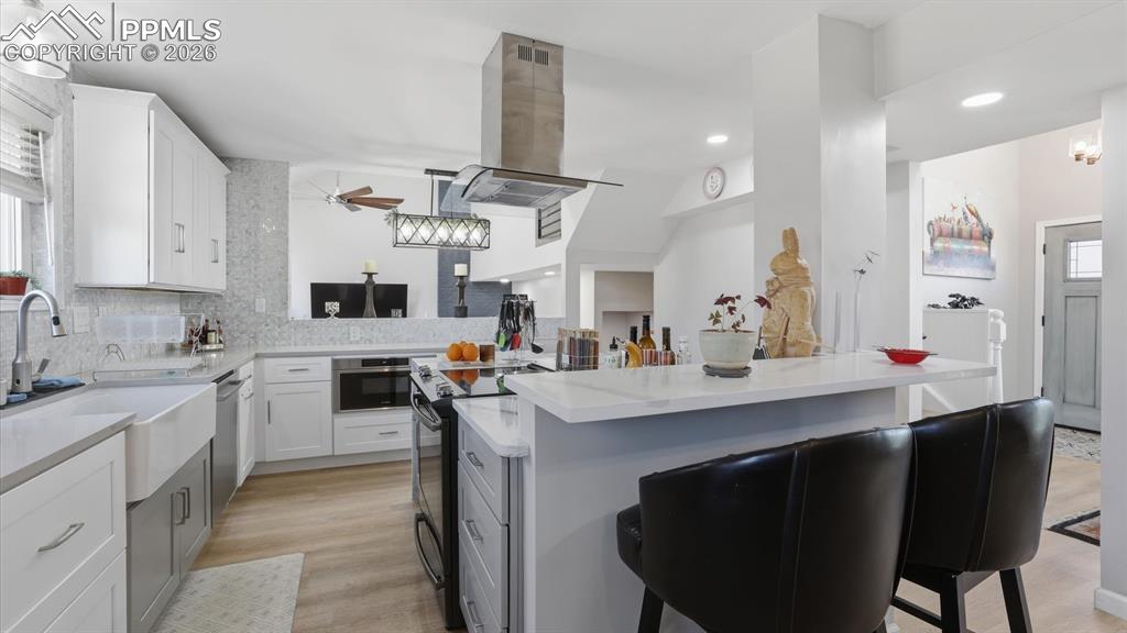 The Kitchen boasts a breakfast bar for informal dining and conversations with the chef.