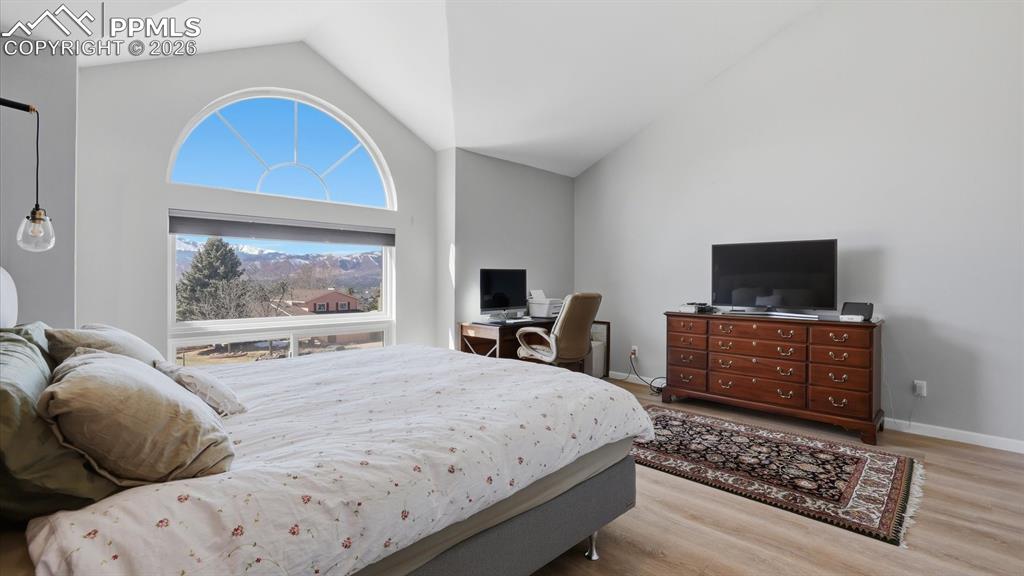 Gorgeous views from the arched window in the Primary Bedroom.