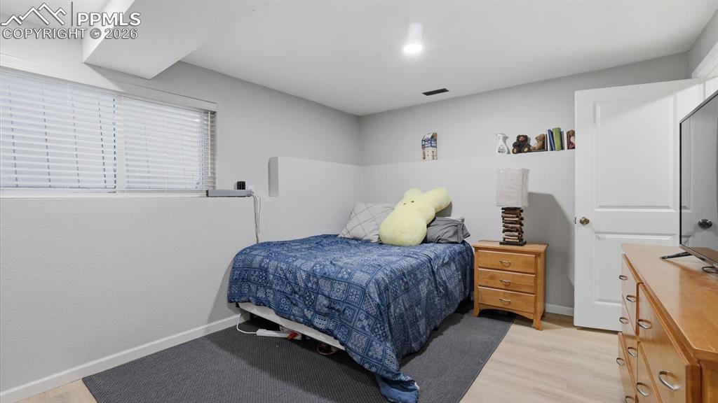 Basement Bedroom #4 with LVP flooring.