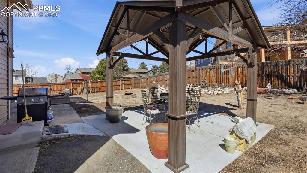 Patio and gazebo for outdoor dining and relaxation.