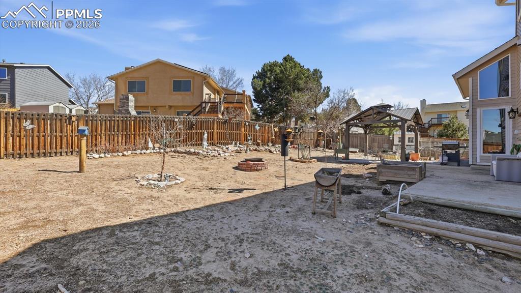 Lots of room in the fenced backyard for the kids and fur babies to run around.