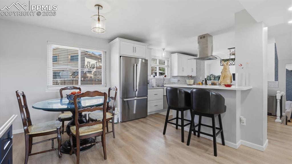 View of the Dining Area and Kitchen.