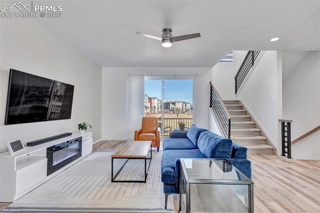 Living room - walkout to deck, recessed lighting, custom wiring for electronics, smart thermostat, custom window treatments