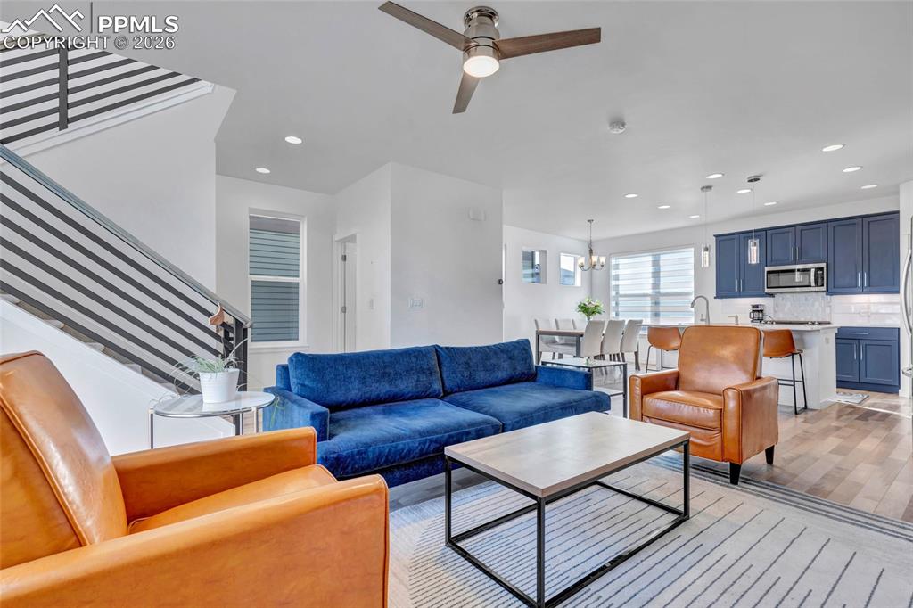 Living room - walkout to deck, recessed lighting, custom wiring for electronics, smart thermostat, custom window treatments