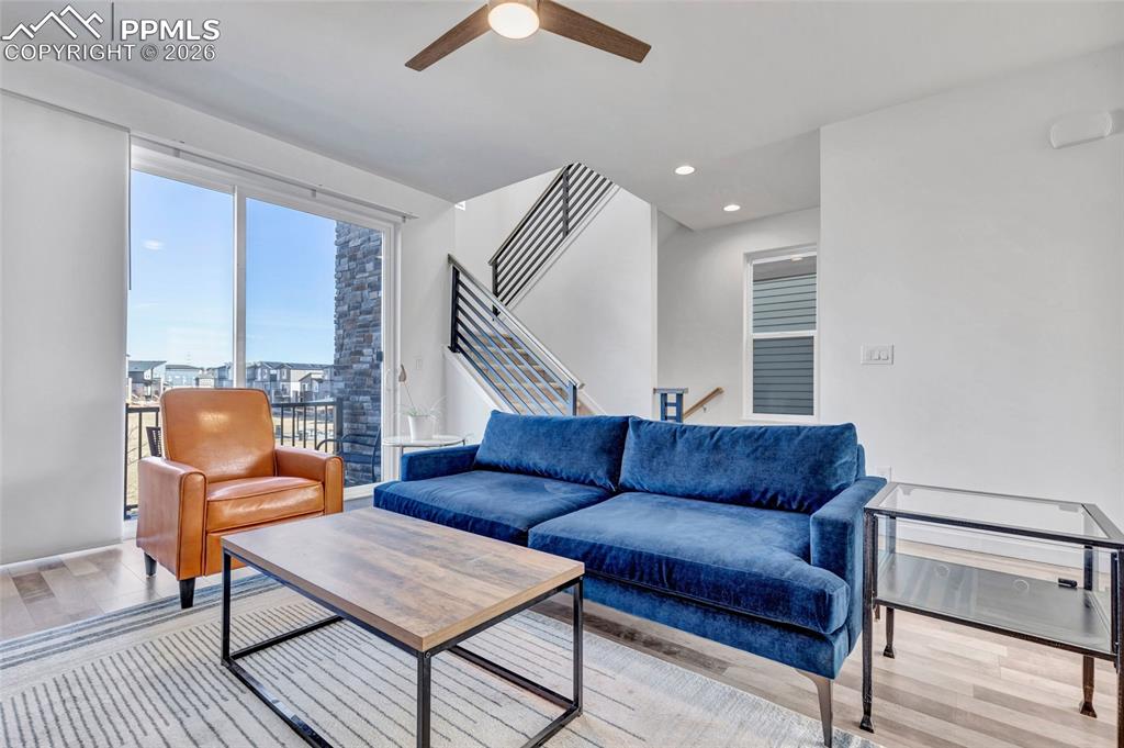 Living room - walkout to deck, recessed lighting, custom wiring for electronics, smart thermostat, custom window treatments