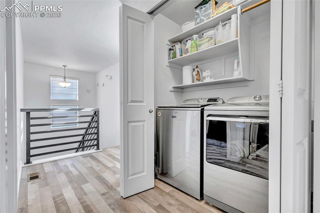 Laundry area - electric hookups, on the same level as the bedrooms, custom shelving
