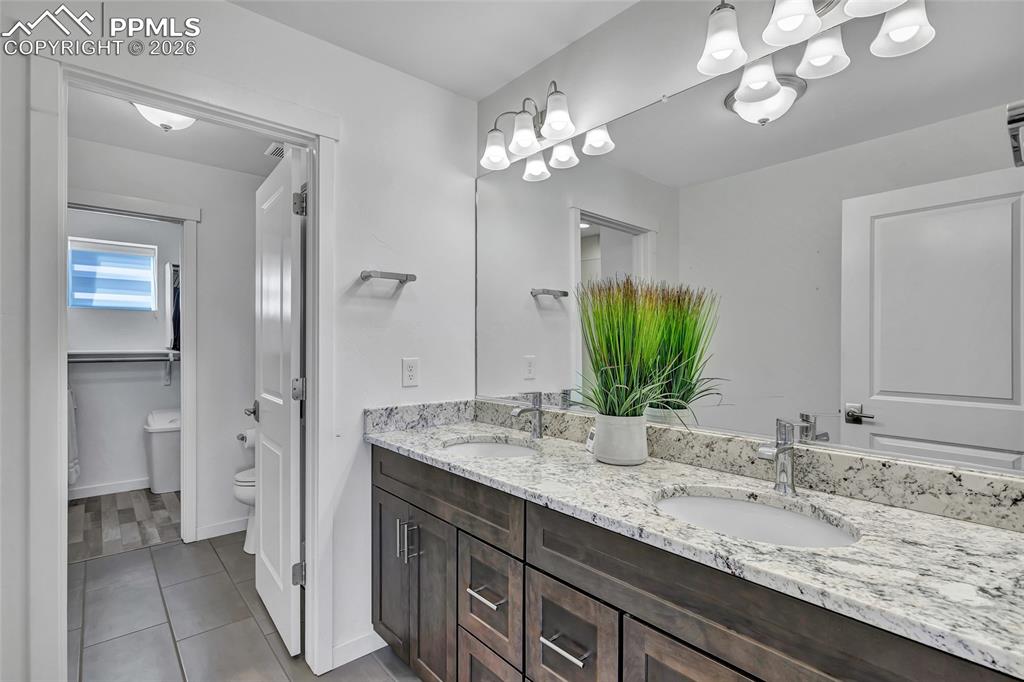 Master bathroom - dual vanity, granite countertops, separate changing area, walk in closet