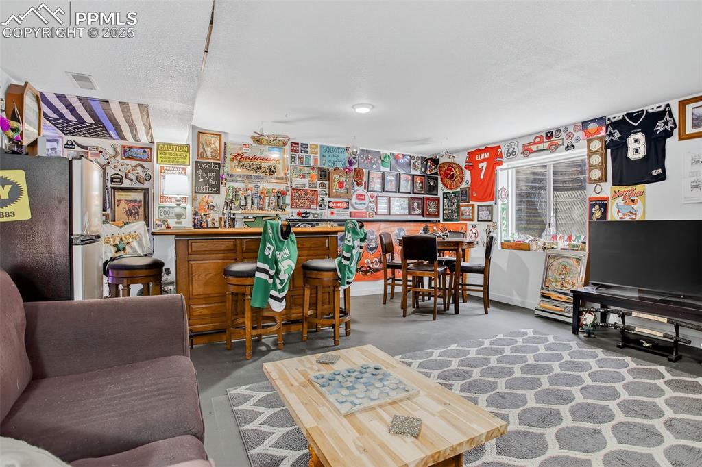 The finished lower level adds exceptional versatility—perfect for a rec room, media space, lounge, or guest retreat. New furnace just installed!