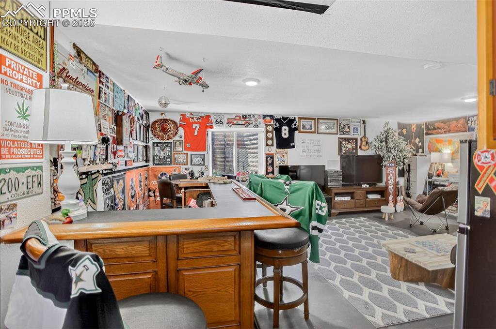 The finished lower level adds exceptional versatility—perfect for a rec room, media space, lounge, or guest retreat. New furnace just installed!