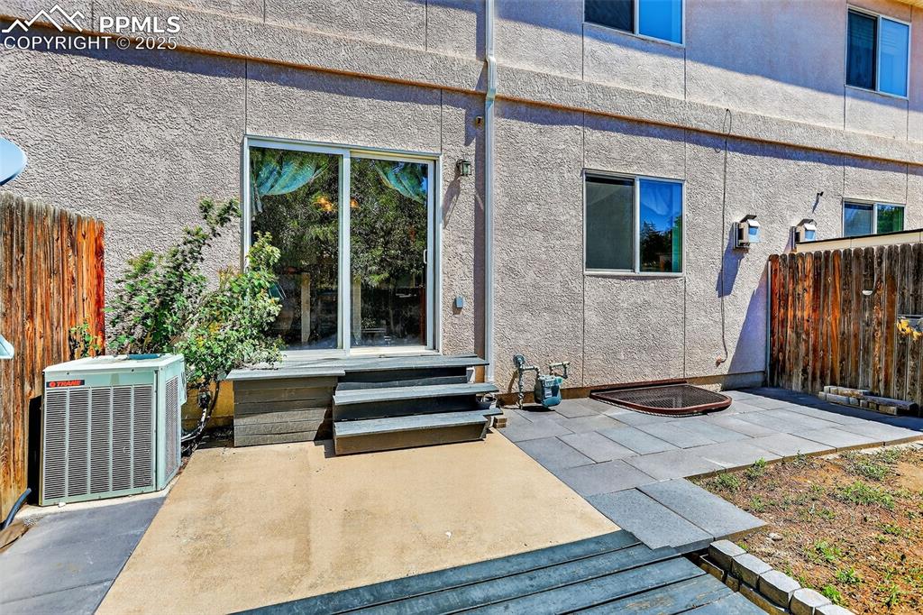 Relax and take in peaceful Colorado evenings from the private, fenced backyard with stunning Pikes Peak views.