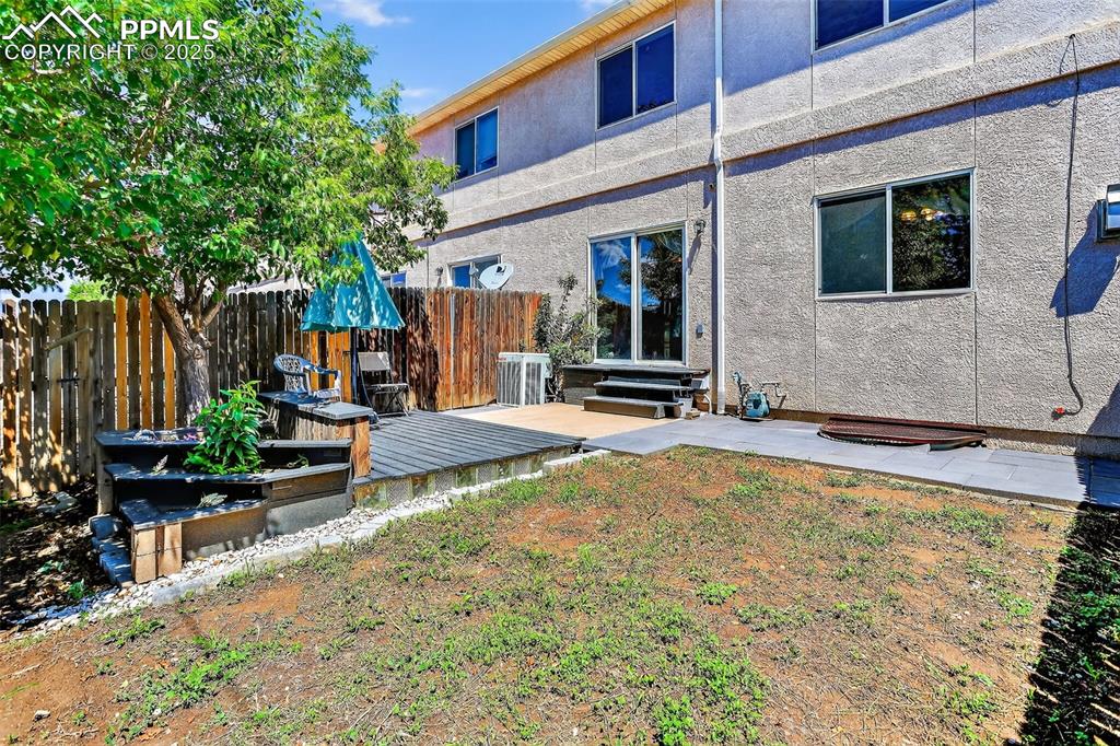 Relax and take in peaceful Colorado evenings from the private, fenced backyard with stunning Pikes Peak views.