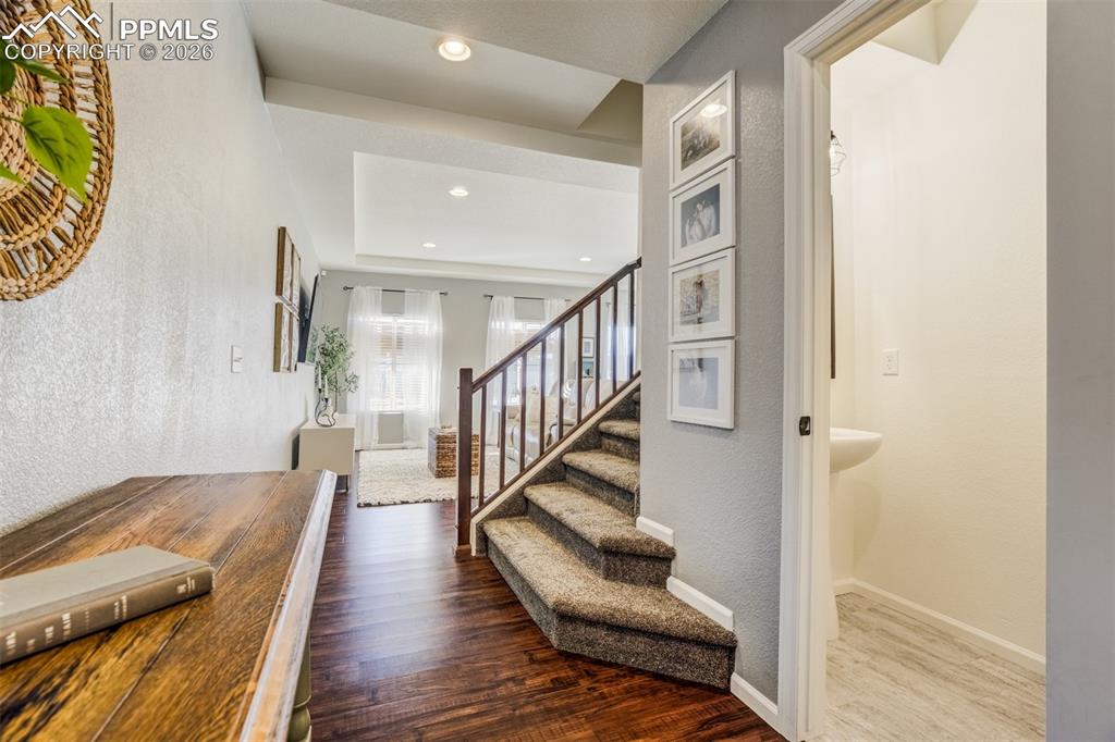 Stairs lead to upper level that has 3 bedrooms. 