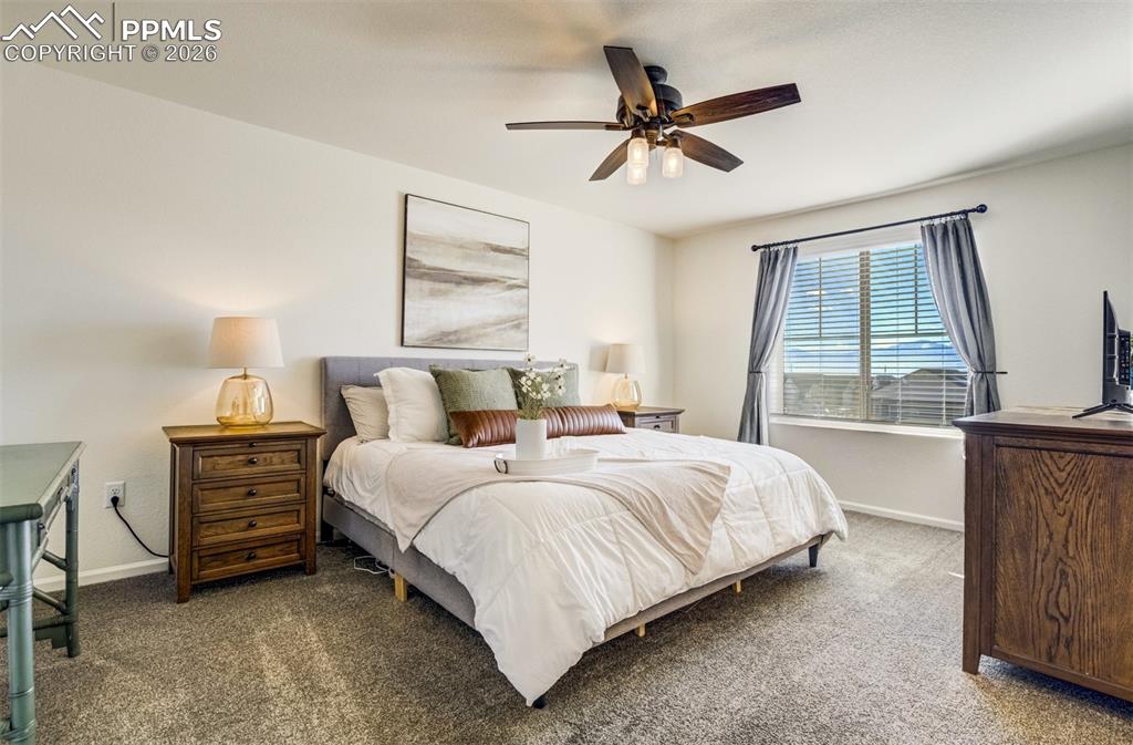 Ceiling fan and space to unwind. 