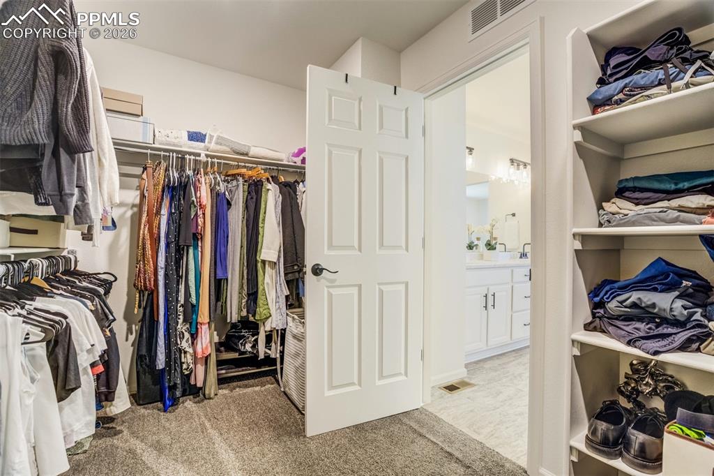 Large walk-in closet. 