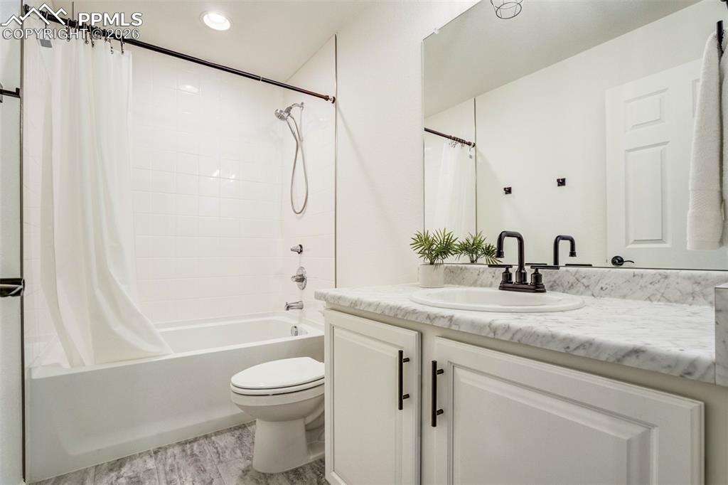Secondary full bathroom upstairs for bedrooms 2 & 3. 