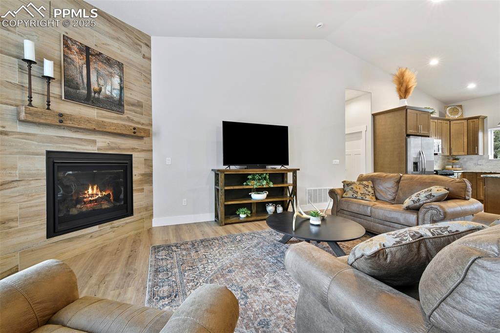 Beautiful Fireplace with Tile Accent Surround 