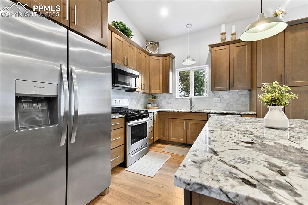 Refrigerator Included. Beautiful Counter Tops and Cabinetry 