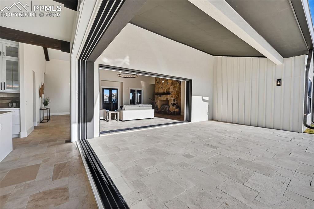 View of patio / terrace with a garage