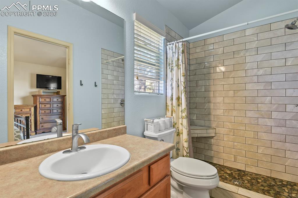 Walk-in shower with updated tile . 