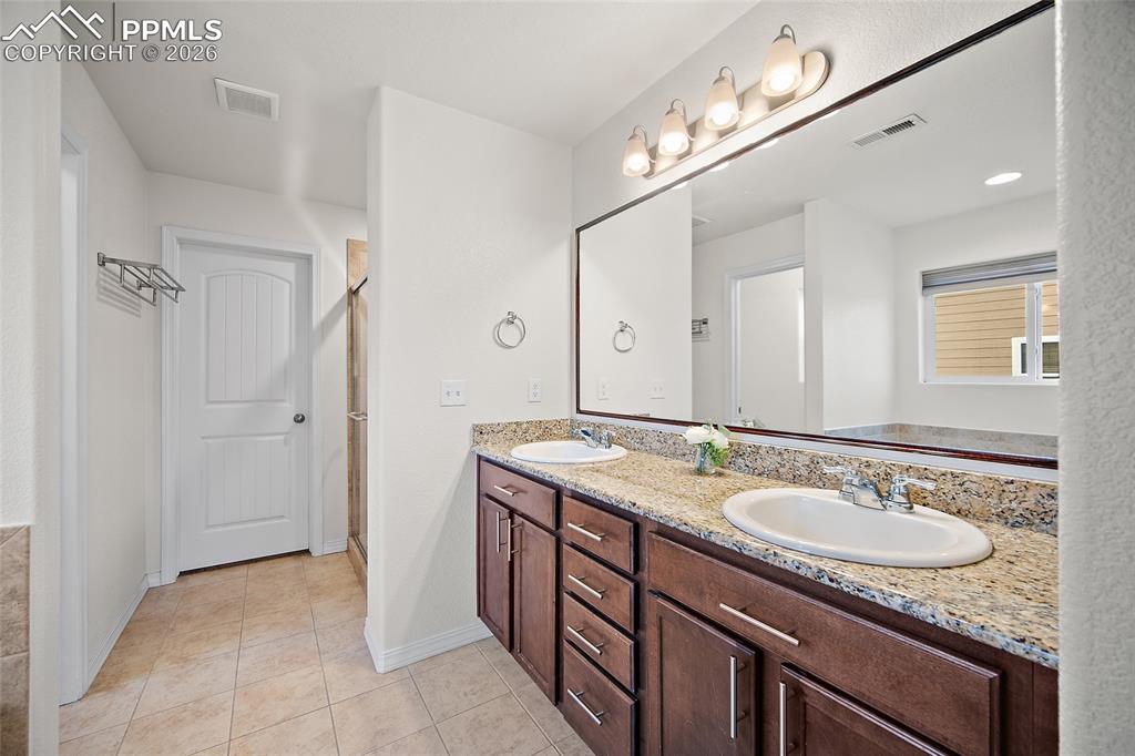 Primary bathroom with double sinks. 