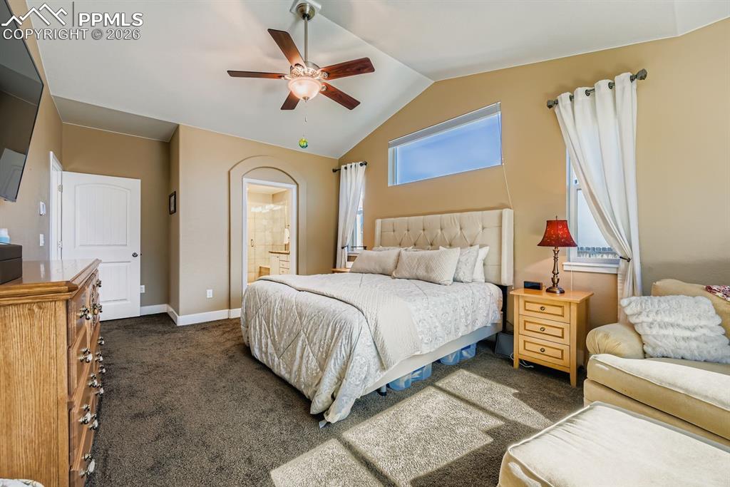Vaulted ceilings and plenty of natural lighting with adjoining bath and walk-in closet