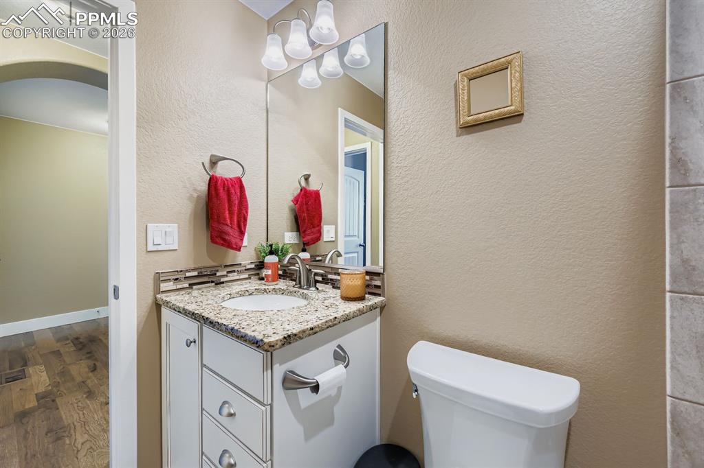 Main level full bath located next to secondary bedroom