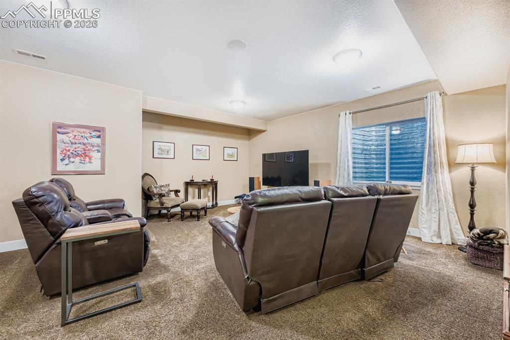 Finished basement with 9+ ceilings and built in speakers