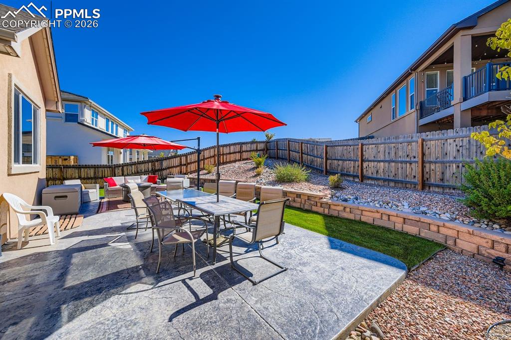 Rear outdoor living space is perfect for cookouts and entertaining