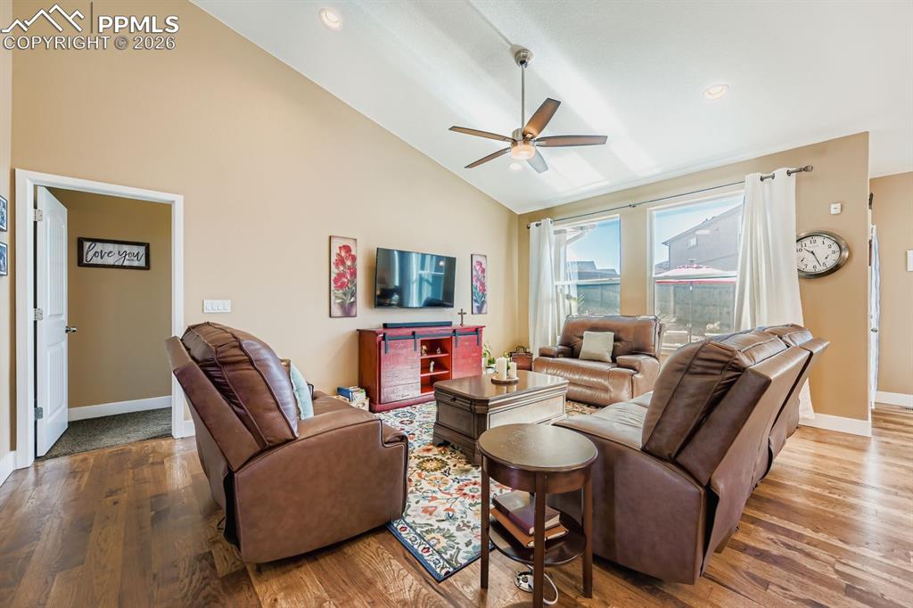 Main level great room, hickory hardwood flooring, thought the main level and two-tone designer wall color